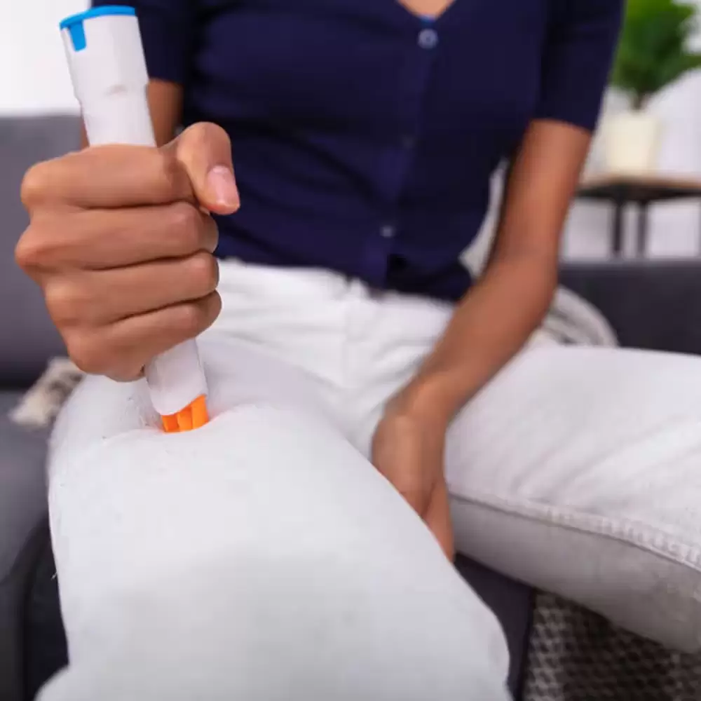 Person using an epipen
